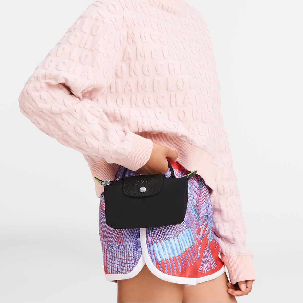 Longchamp Élan Mini Bag — zbliżenie na złote okucia i detale.