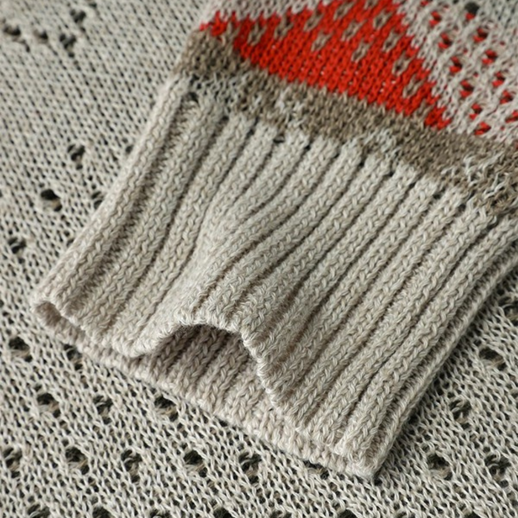 Sweter damski z długim rękawem i geometrycznym nadrukiem